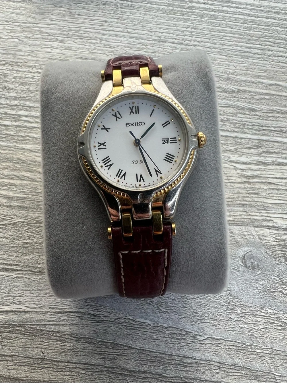 Seiko SQ 50 Silver and Gold Case Watch with White Dial and Leather Strap